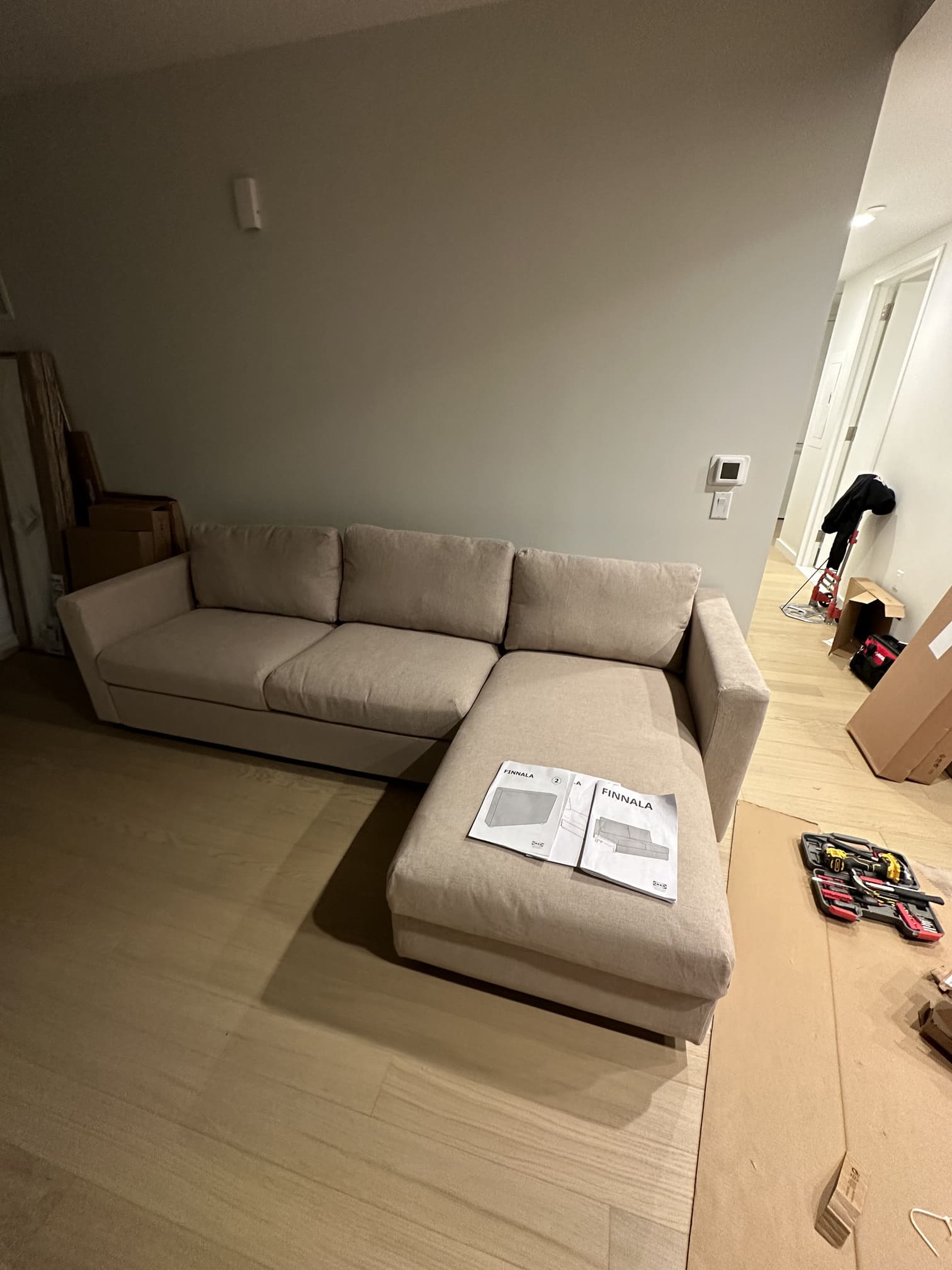 Moving boxes stacked in a new apartment