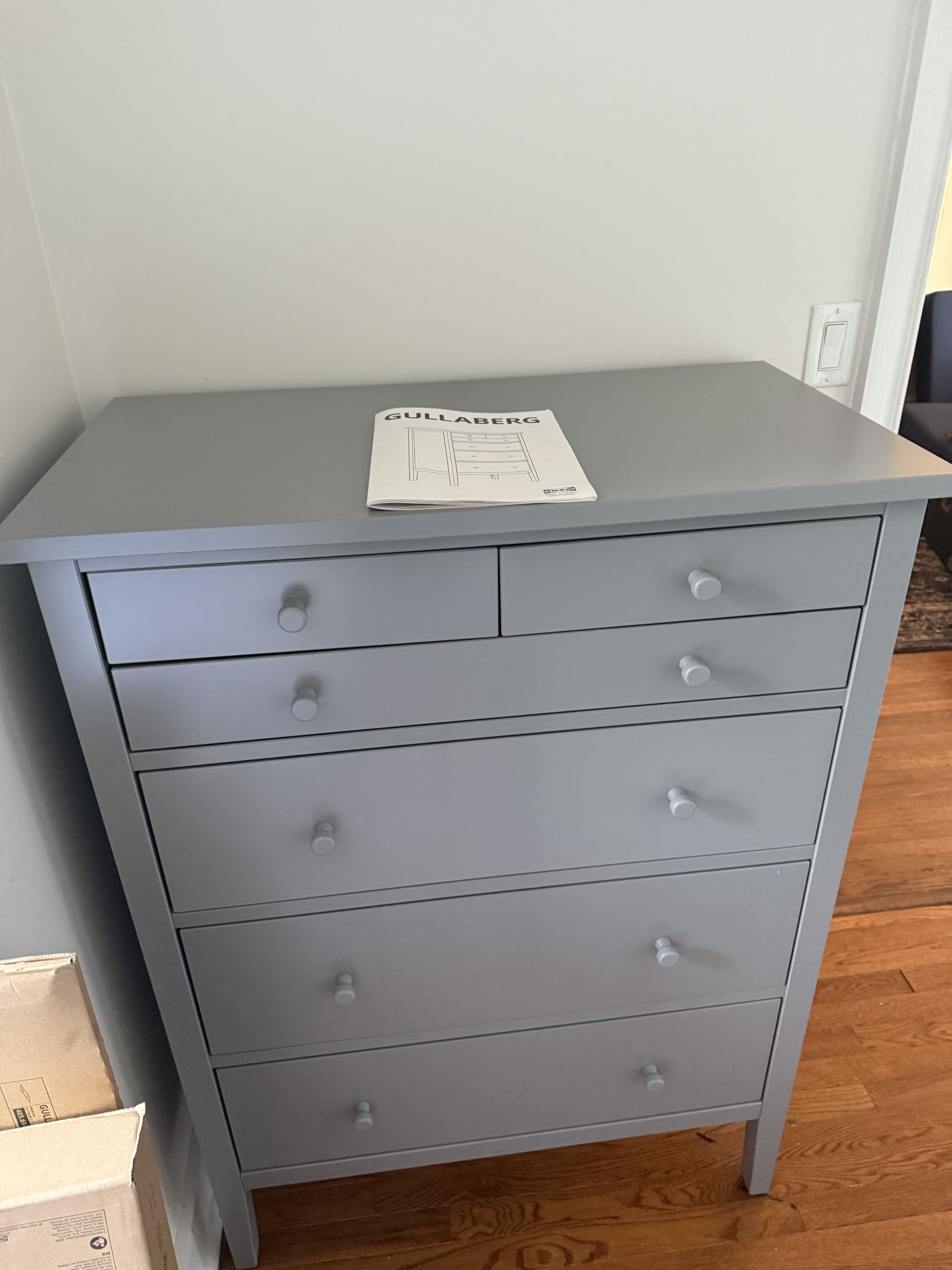 Removing an old mattress from a bedroom