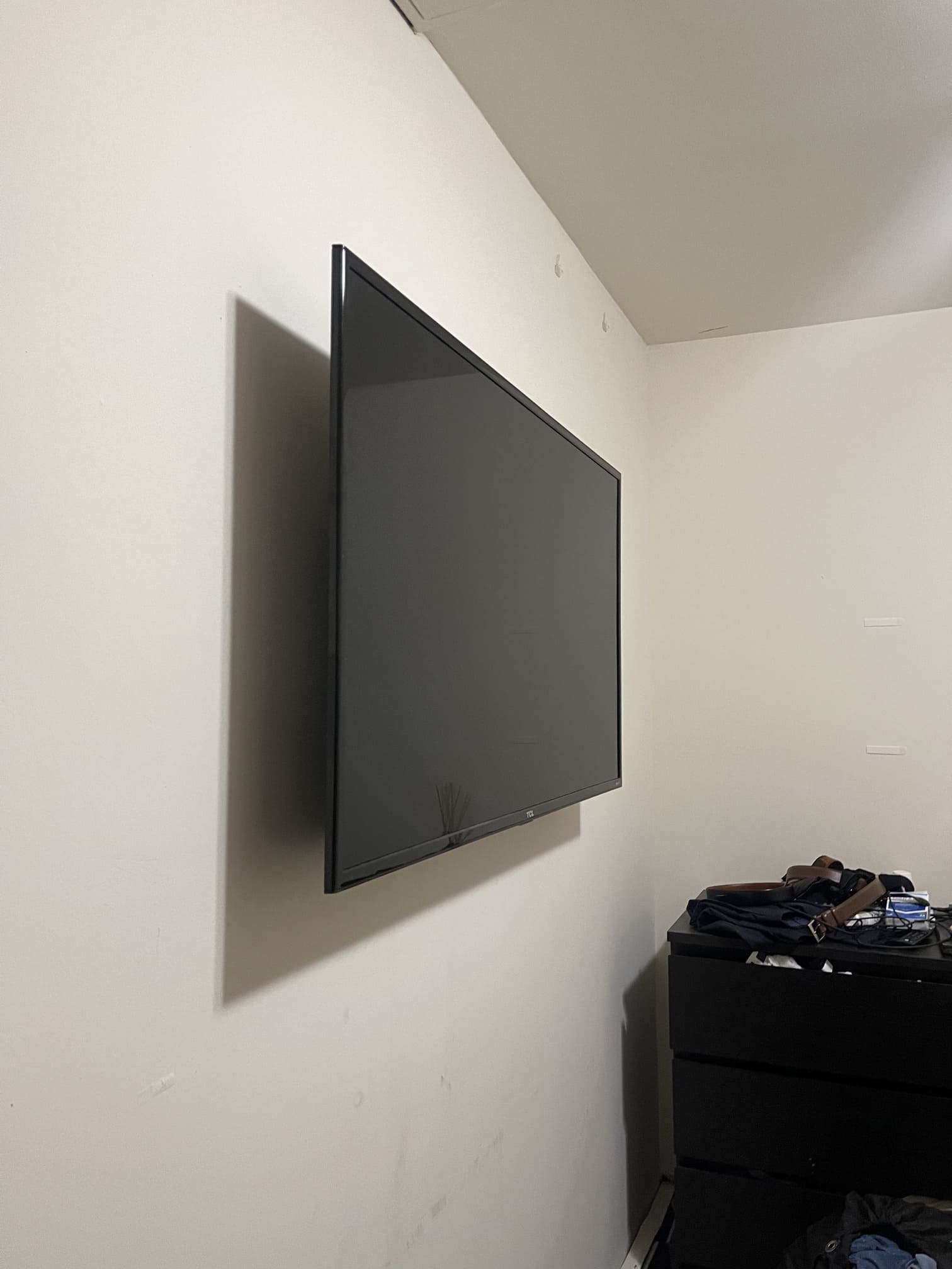 Hanging artwork on a gallery wall