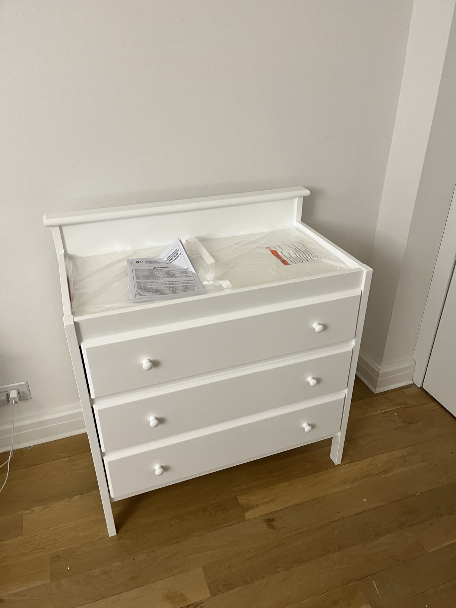 Carefully wrapping furniture for a move