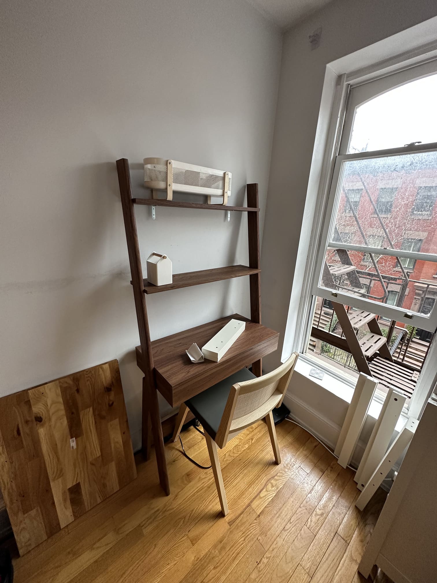 Gallery wall of framed photos mounted on a wall