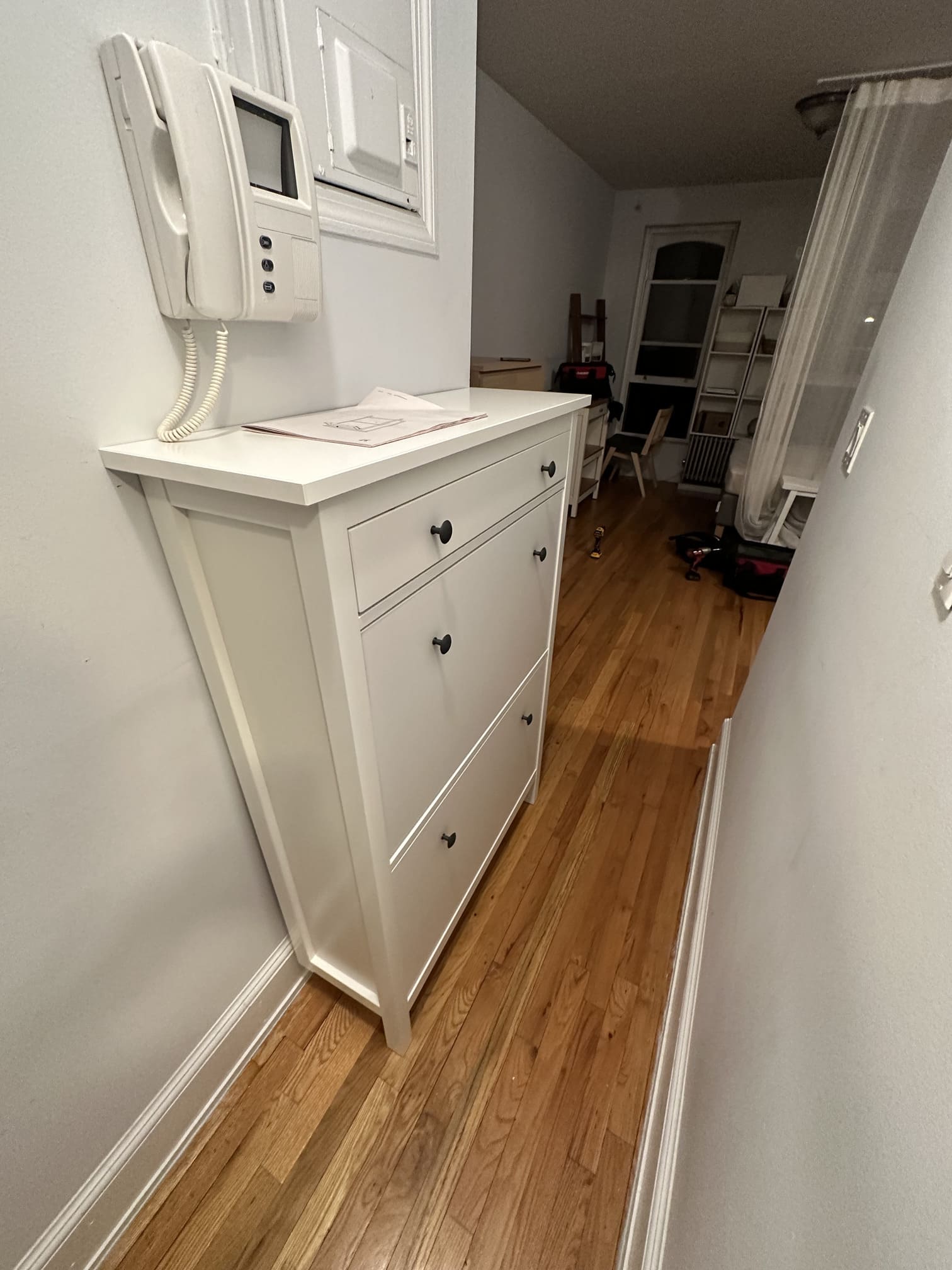 Old couch being removed from a home